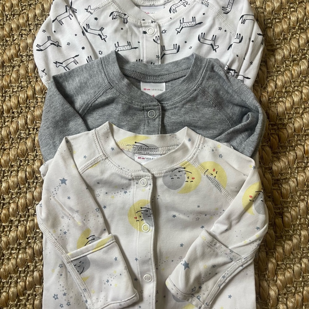 3 pairs Hanna Andersson footie pajamas
